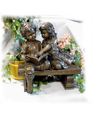Boy and Girl Reading on Bench - Bronze
